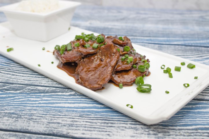 foodiesfeed.com_mongolian-beef-on-a-white-plate